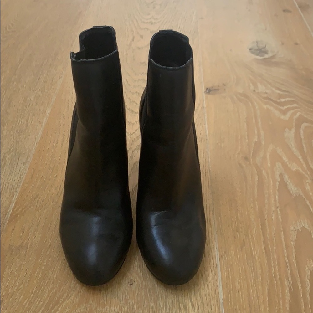 Black leather heeled ankle bootie